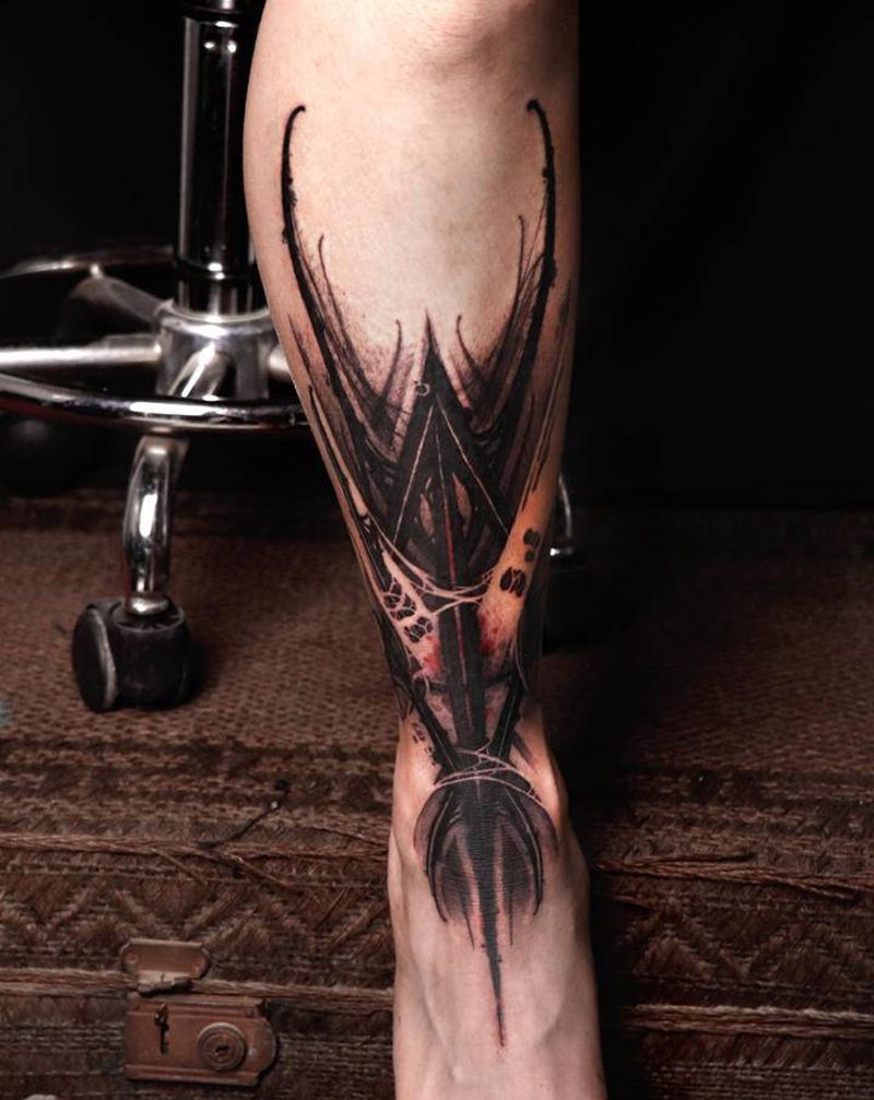 真细纹身图片_腿部几何点刺纹身图案