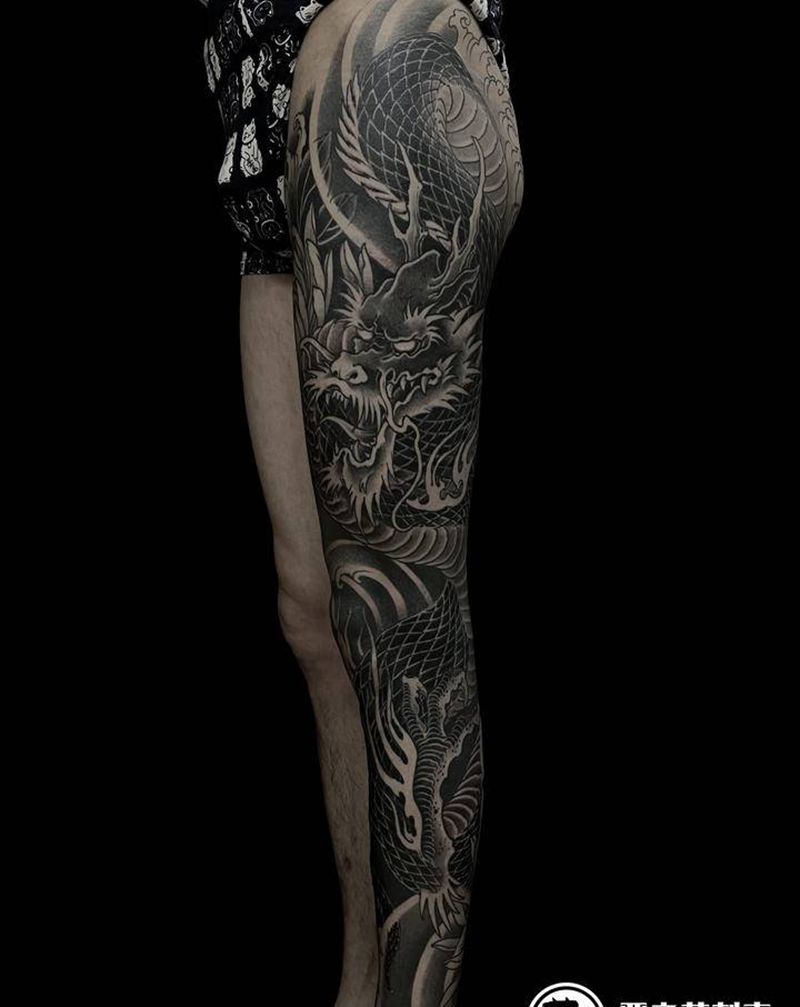 龙花腿纹身图片_腿部新传统龙纹身图案