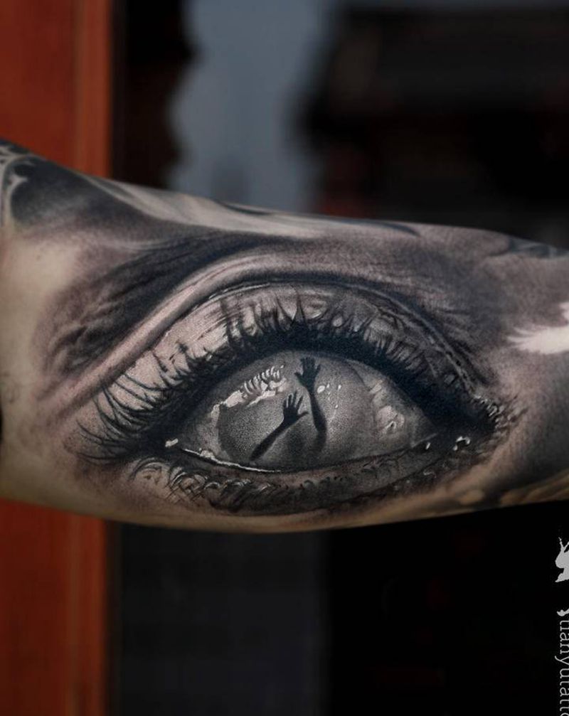两三年前的图 眼睛做个收尾纹身图片_手臂欧美写实纹身图案