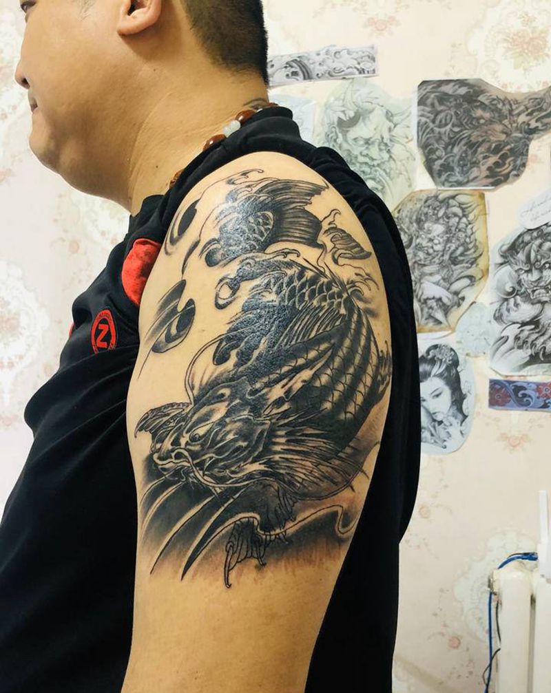 鱼化龙纹身图片_手臂新传统纹身图案