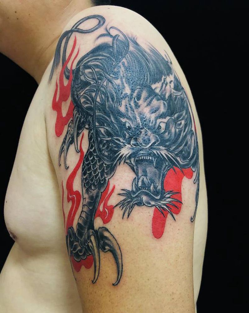 大臂麒麟纹身图片_手臂新传统纹身图案