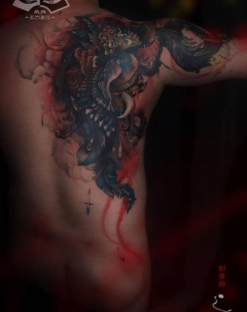 《涅槃重生》纹身图片_背部水墨凤凰纹身图案