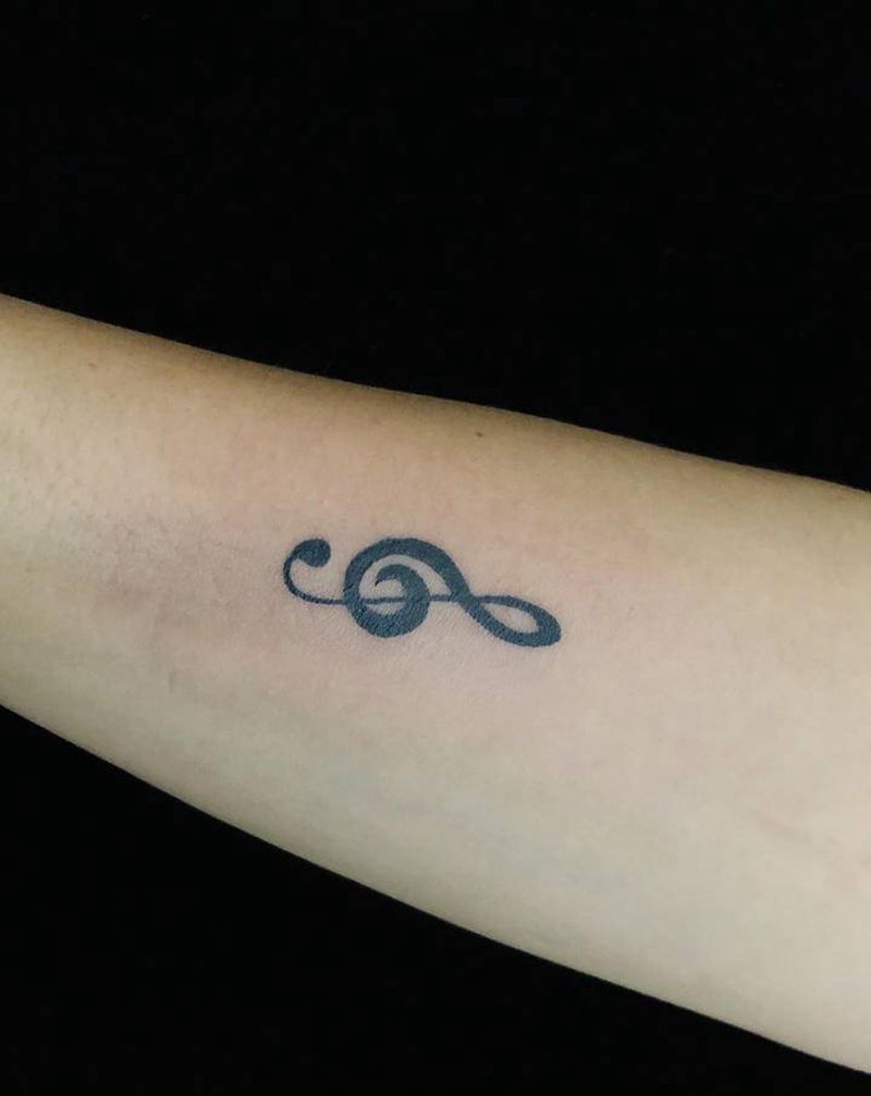 音符纹身图片_手臂新传统纹身图案