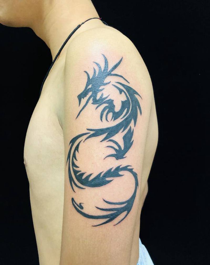 大臂龙纹身图片_手臂新传统纹身图案
