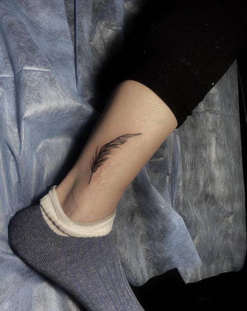 羽毛纹身图片_腿部新传统纹身图案