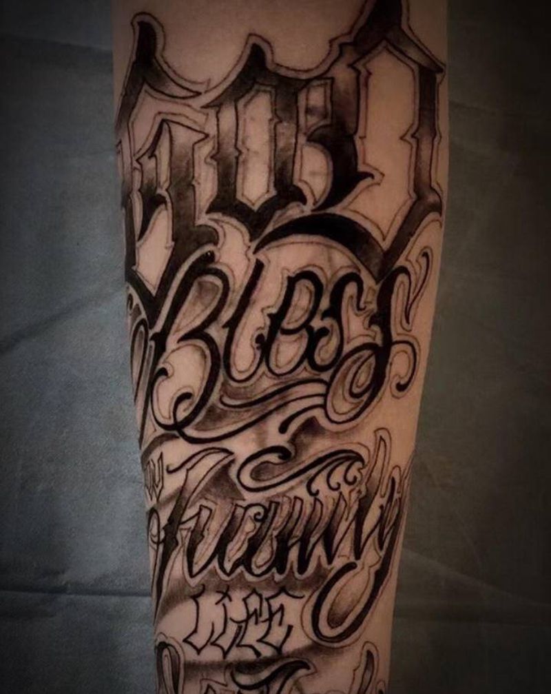 花体字纹身图片_手臂纹身图案