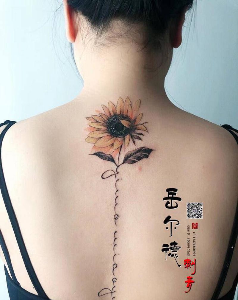 瓜子坨坨纹身图片_背部纹身图案