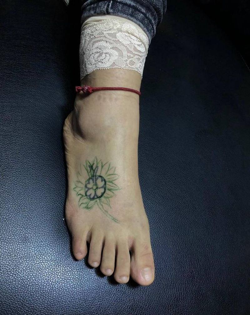 向日葵纹身图片_腿部脚部纹身图案