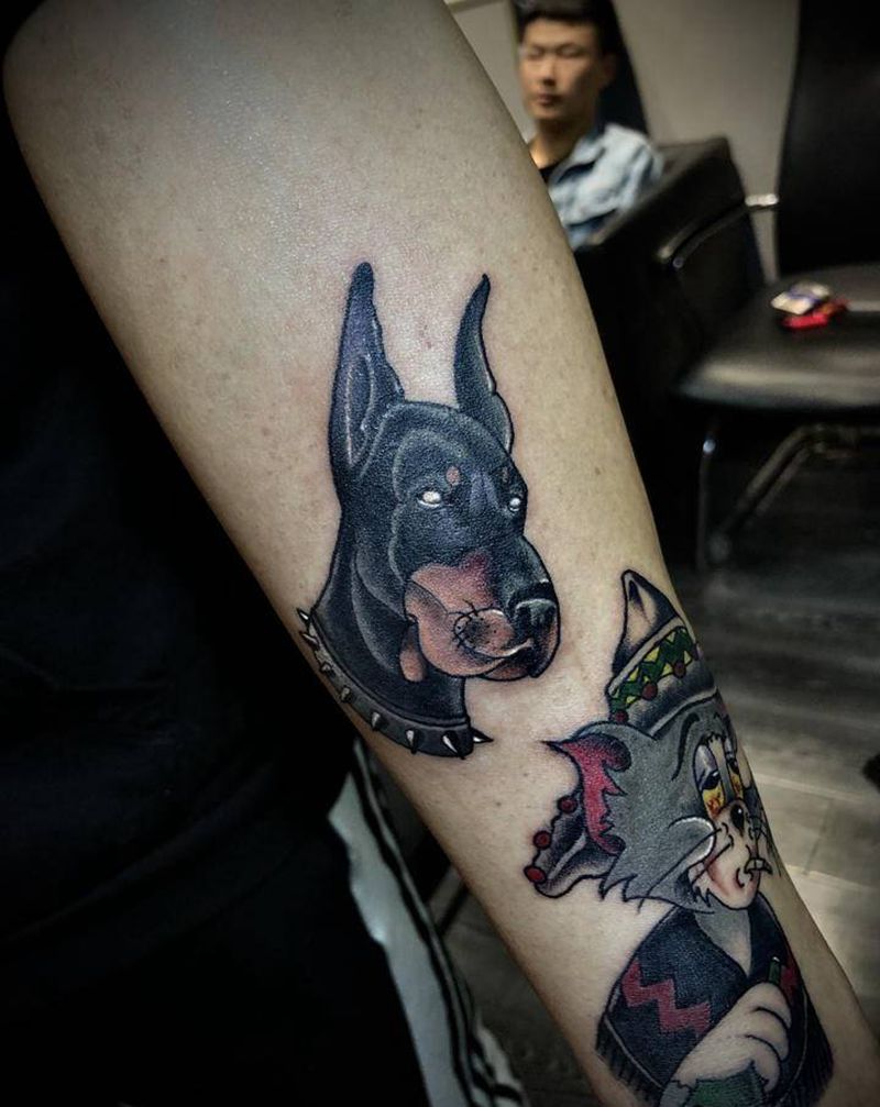 杜宾犬与汤姆猫纹身图片_手臂Old SchoolNew School纹身图案