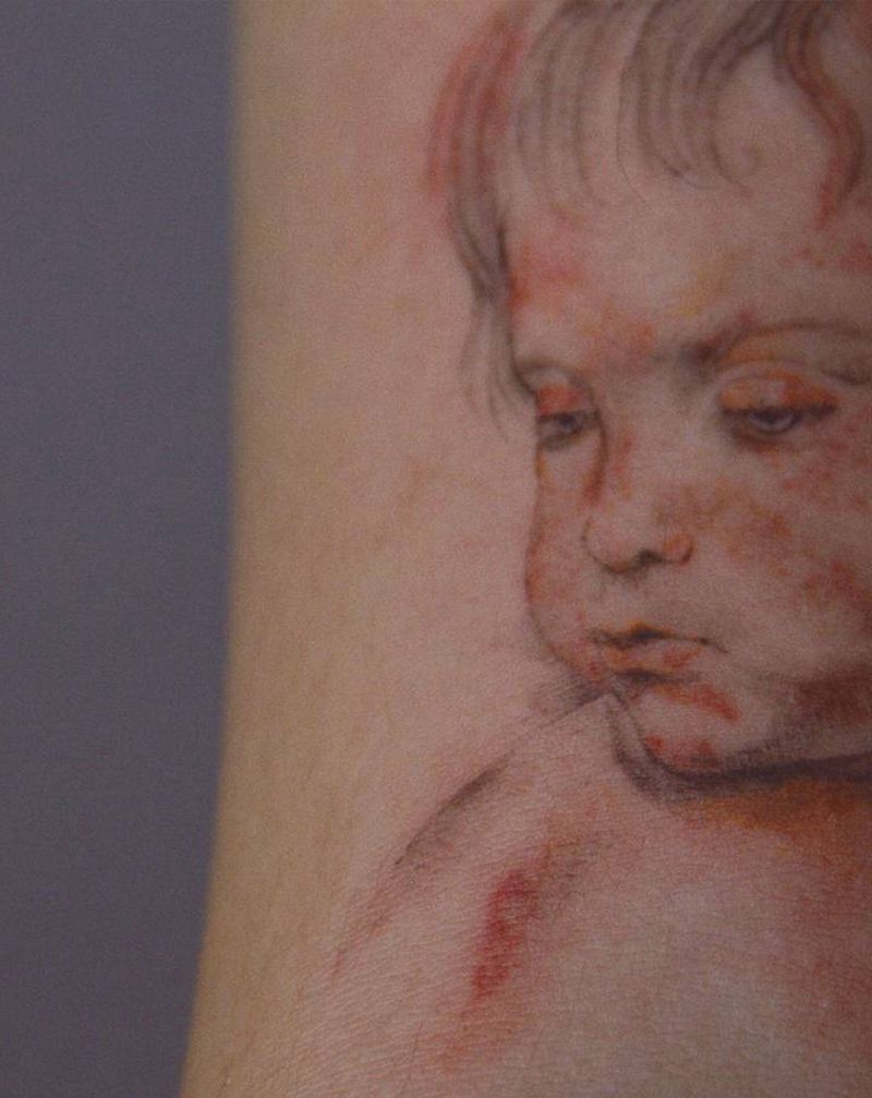 鲁本斯纹身图片_手臂手部表现主义纹身图案