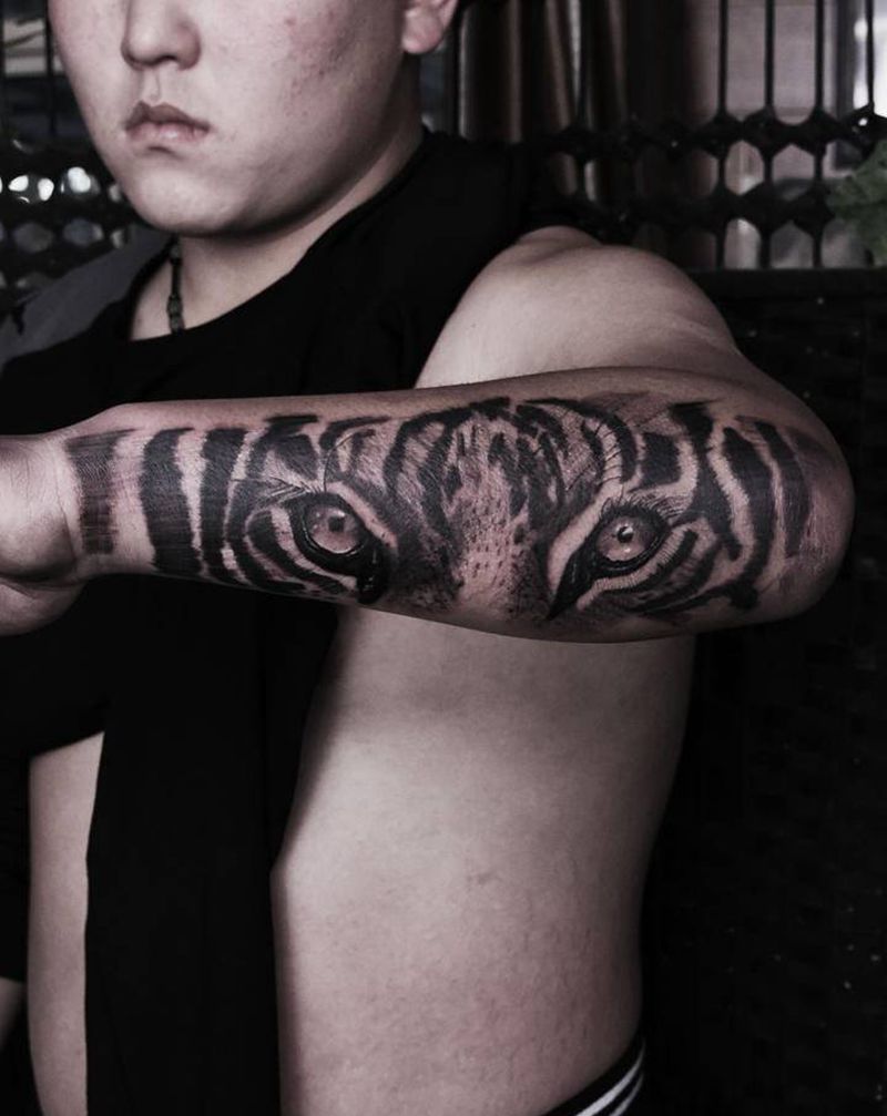 老虎纹身图片_手臂腿部欧美写实老虎纹身图案