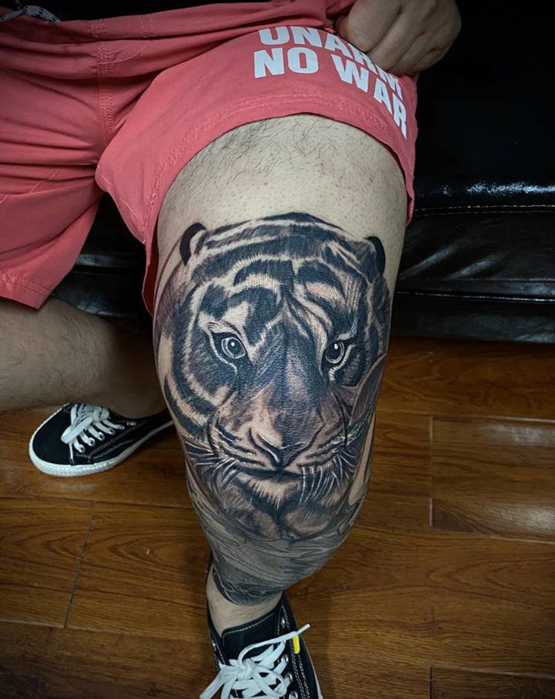 小老虎纹身图片_手臂腿部欧美写实纹身图案