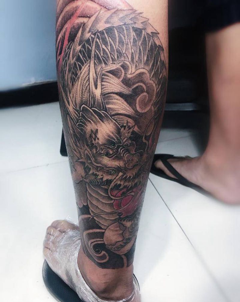 老传统龙纹身图片_腿部老传统纹身图案