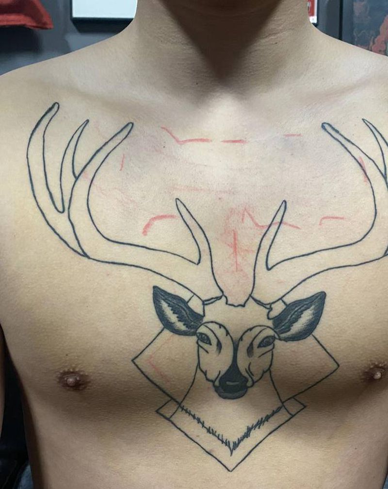 毁皮修改遮盖纹身图片_胸部纹身图案