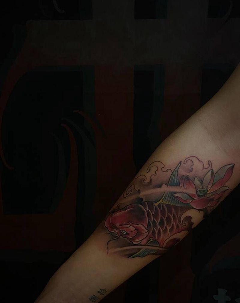 传统-小鱼纹身图片_手臂新传统纹身图案