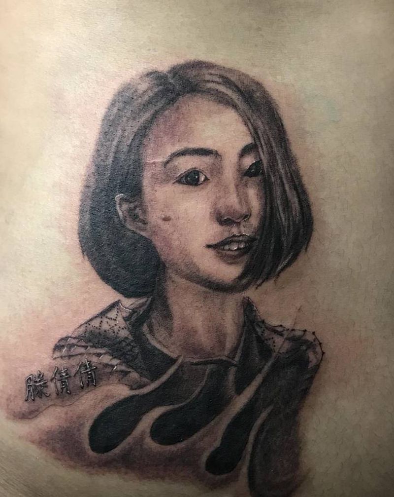 人物纹身图片_腰部纹身图案