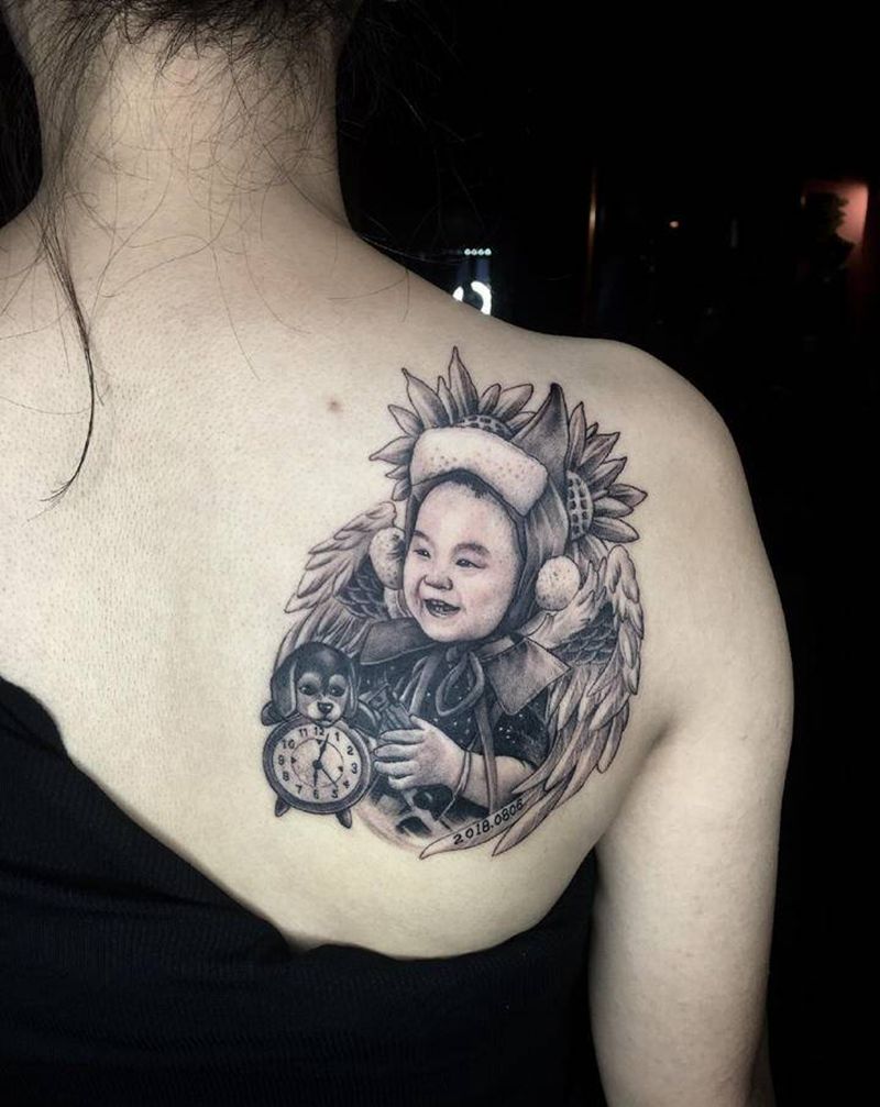 宝宝肖像。靳凯作品纹身图片_肩部背部欧美写实人物肖像原创纹身图案