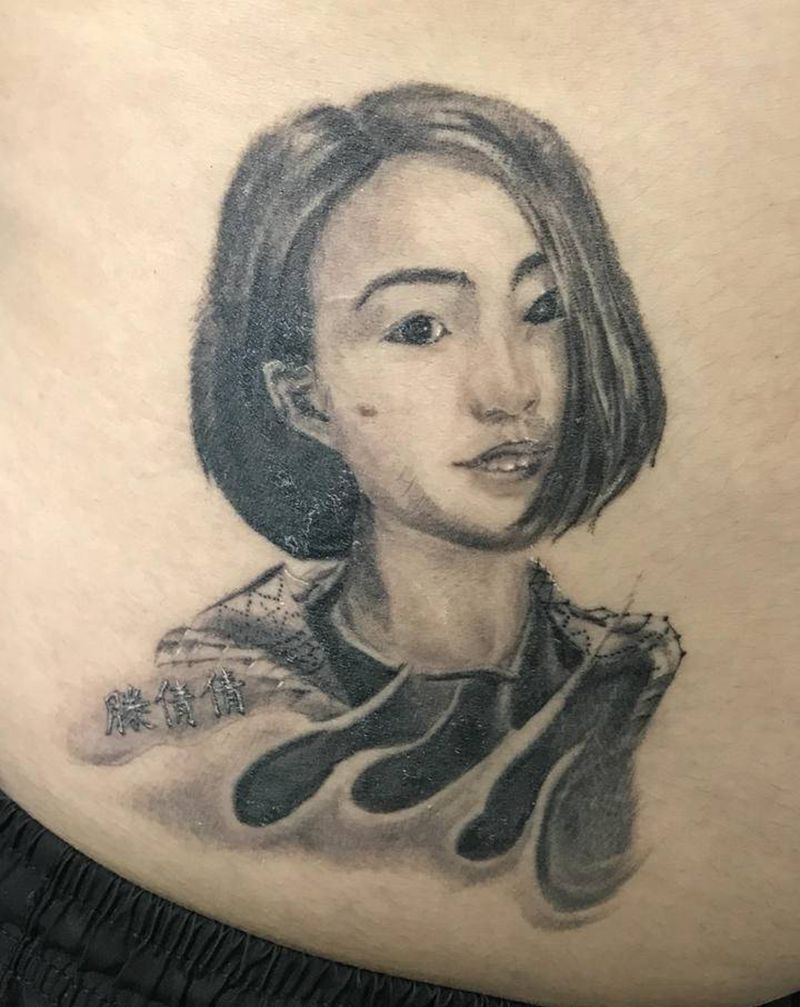 人物肖像纹身图片_腰部肖像纹身图案