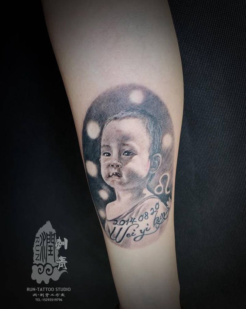 宝宝肖像纹身图片_手臂欧美写实纹身图案