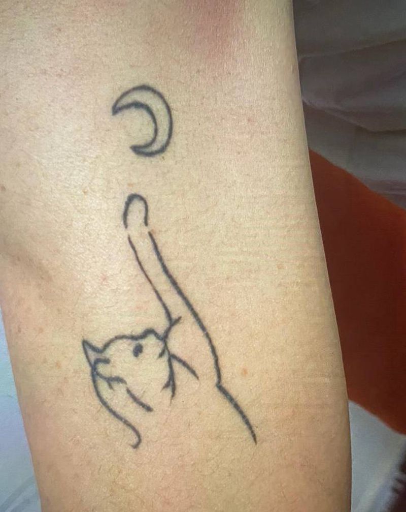 信仰纹身图片_手臂点刺纹身图案