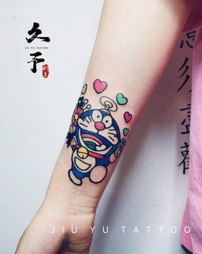 多啦A梦纹身图片_手臂New School卡通纹身图案