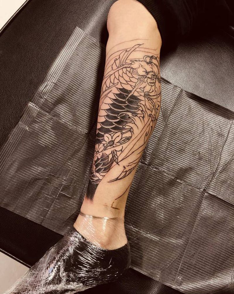 鳌鱼未完纹身图片_腿部新传统纹身图案