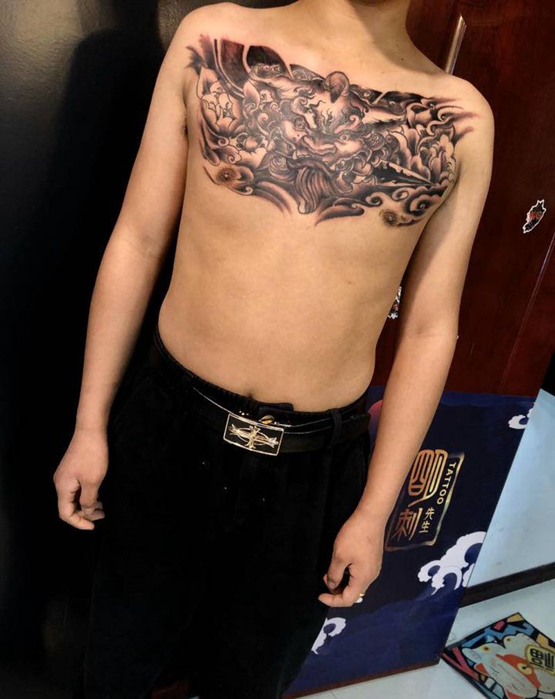 唐狮纹身图片_胸部新传统纹身图案