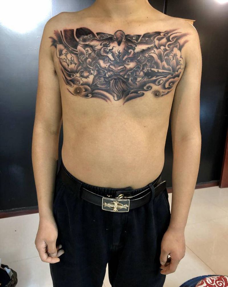 唐狮纹身图片_胸部新传统纹身图案