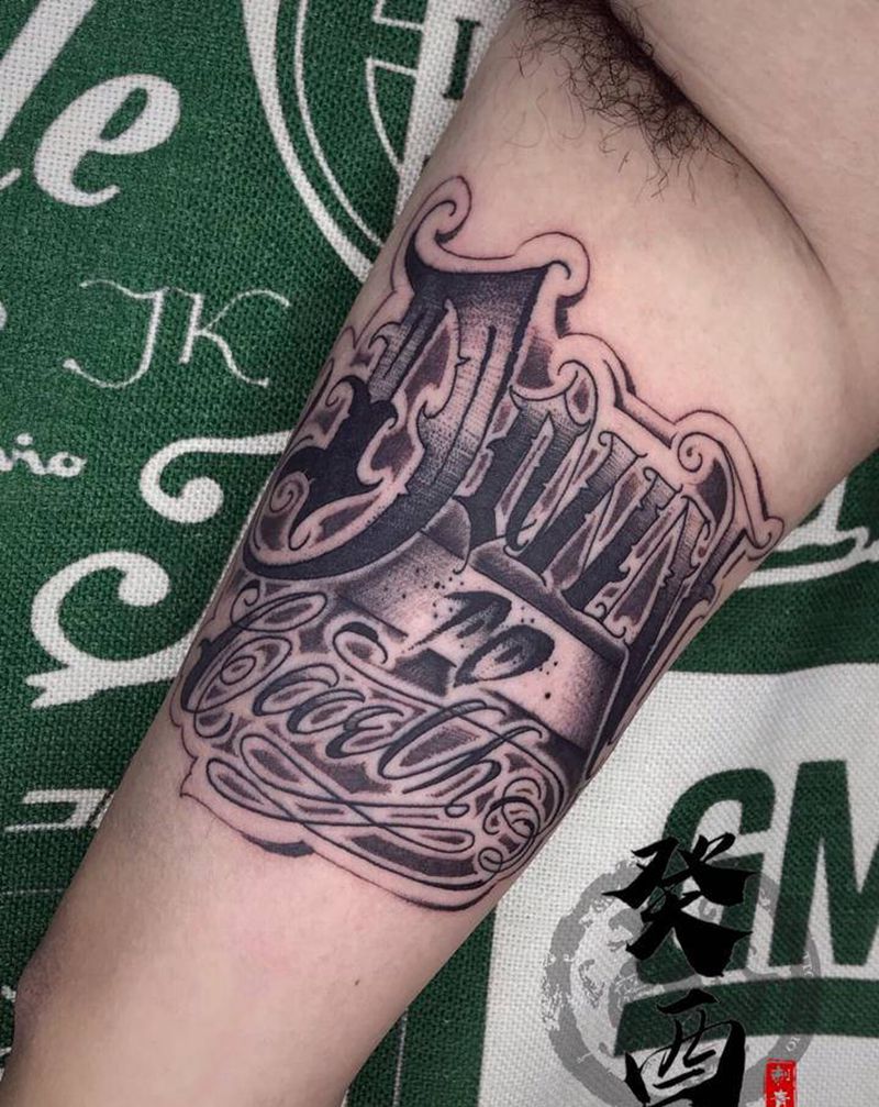 奇卡诺纹身图片_手臂花体字纹身图案