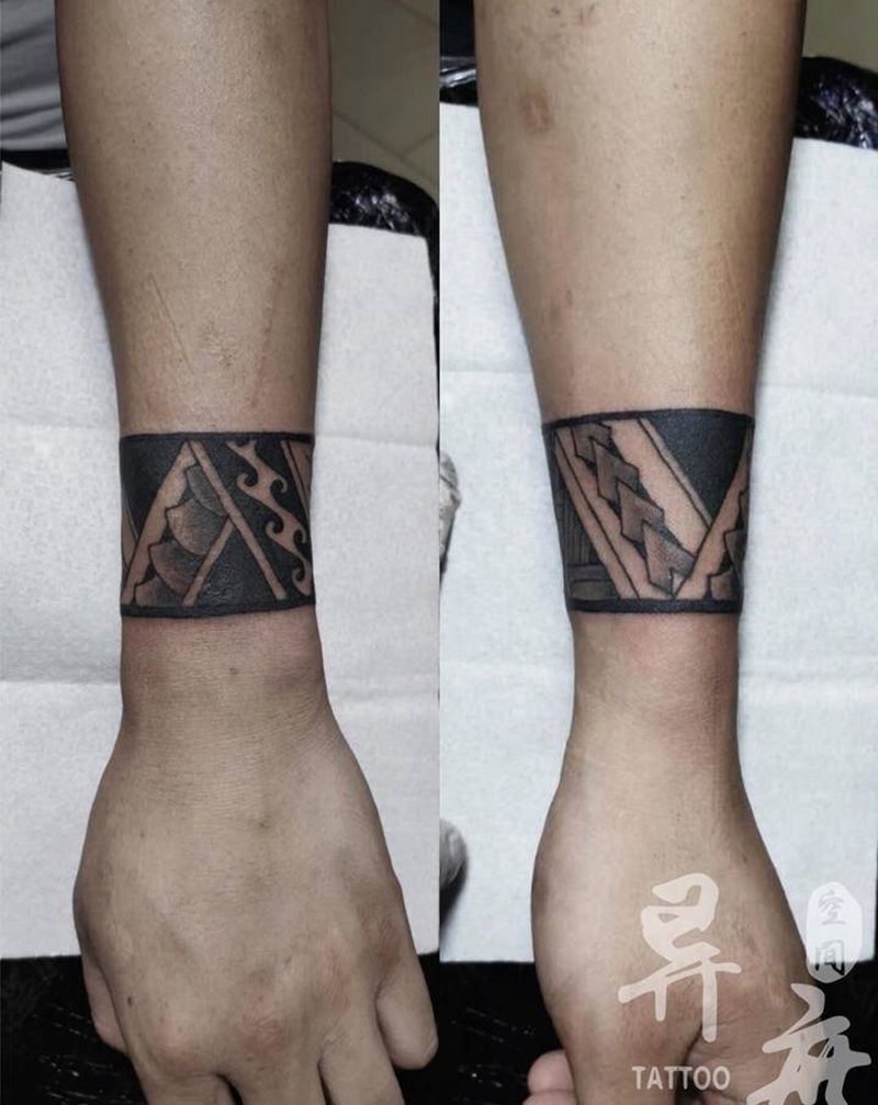 图腾臂环纹身图片_手臂图腾纹身图案