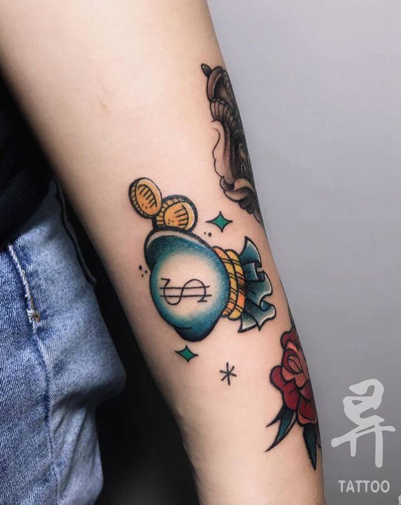 钱袋纹身图片_手臂腿部Old School欧美金币纹身图案