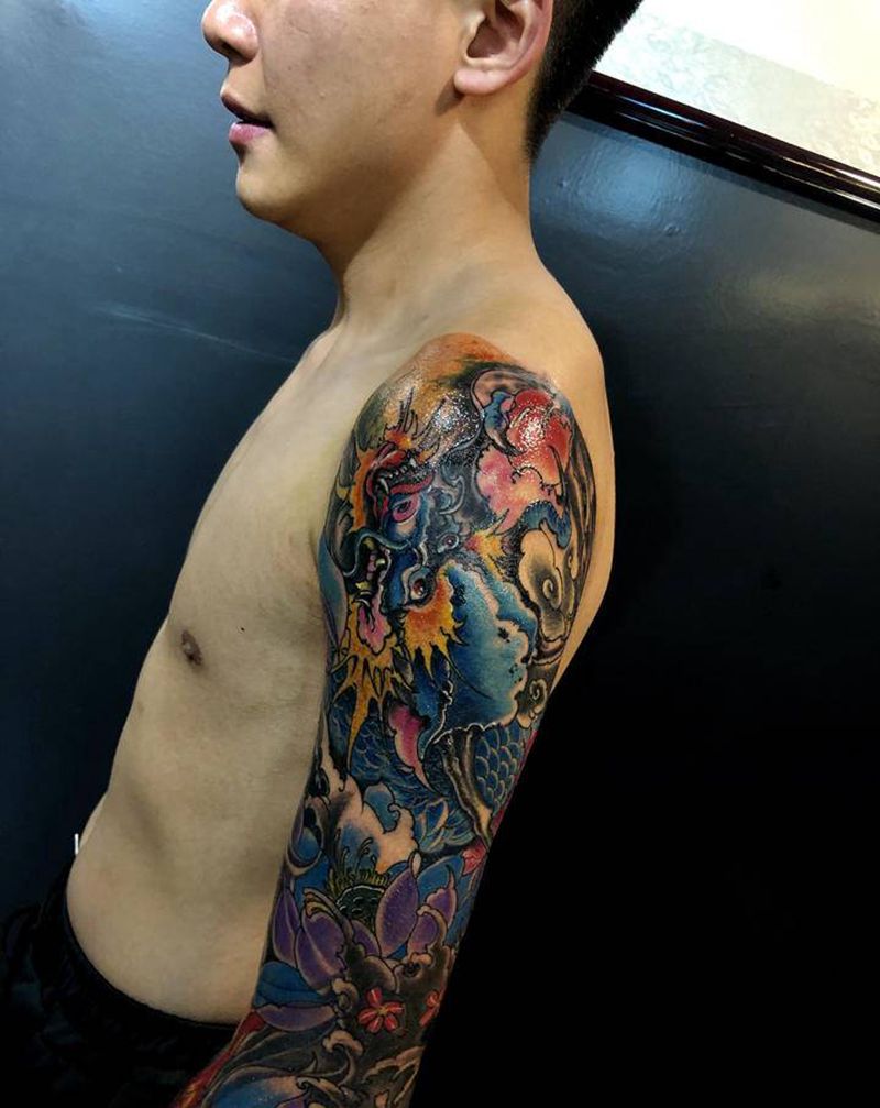新传统龙纹身图片_手臂新传统纹身图案