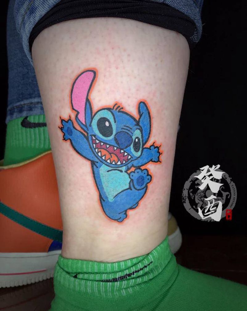 史迪仔纹身图片_腿部卡通纹身图案