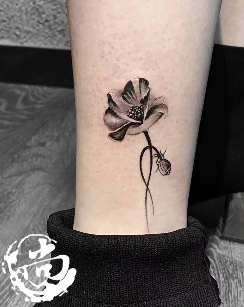 罂粟……纹身图片_腿部水墨纹身图案