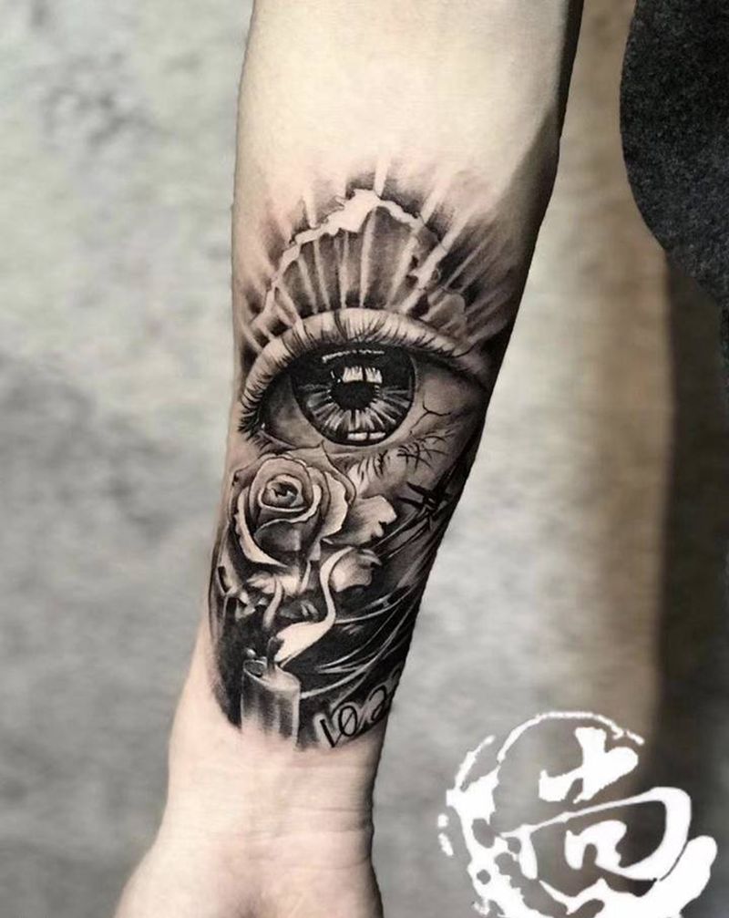 眼中花纹身图片_手臂欧美写实纹身图案