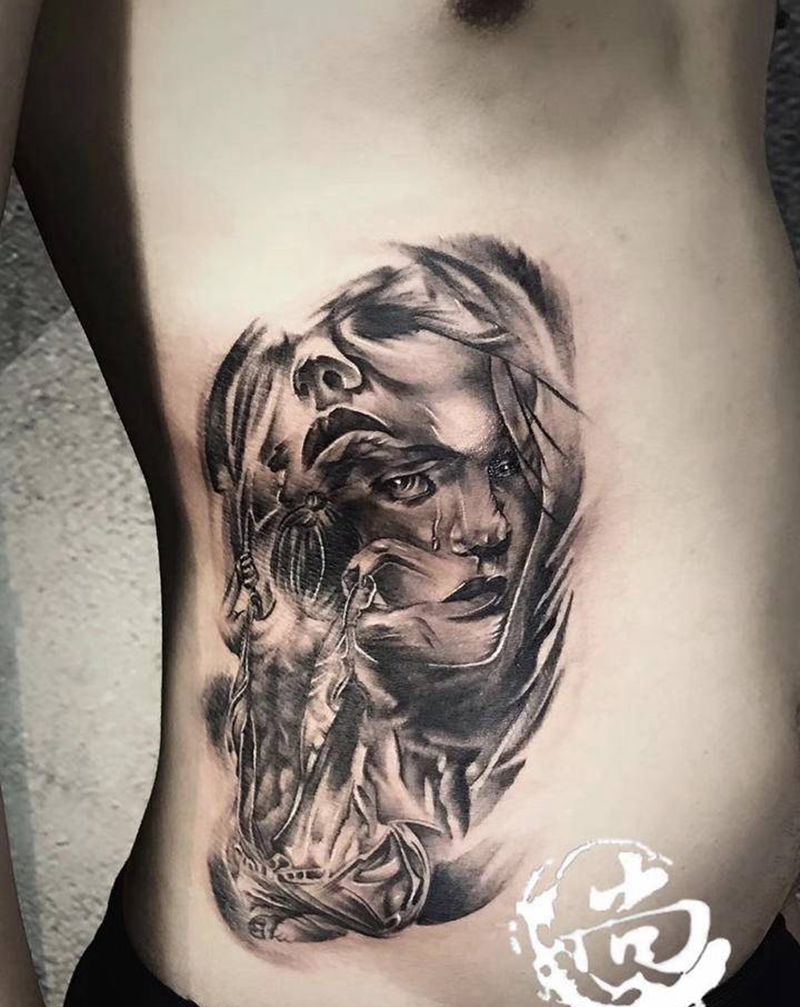 人面纹身图片_腰部欧美写实纹身图案