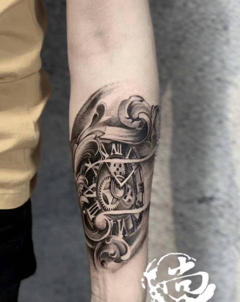 时间轮盘纹身图片_手臂欧美写实纹身图案