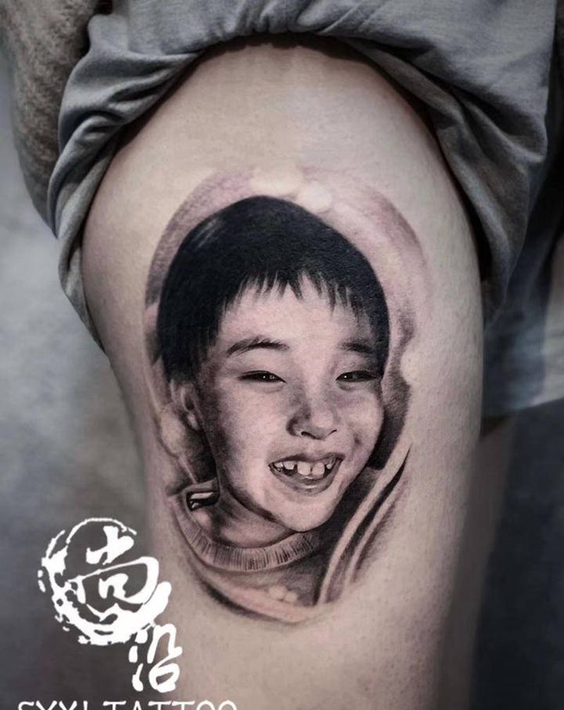 肖像纹身图片_腿部欧美写实纹身图案