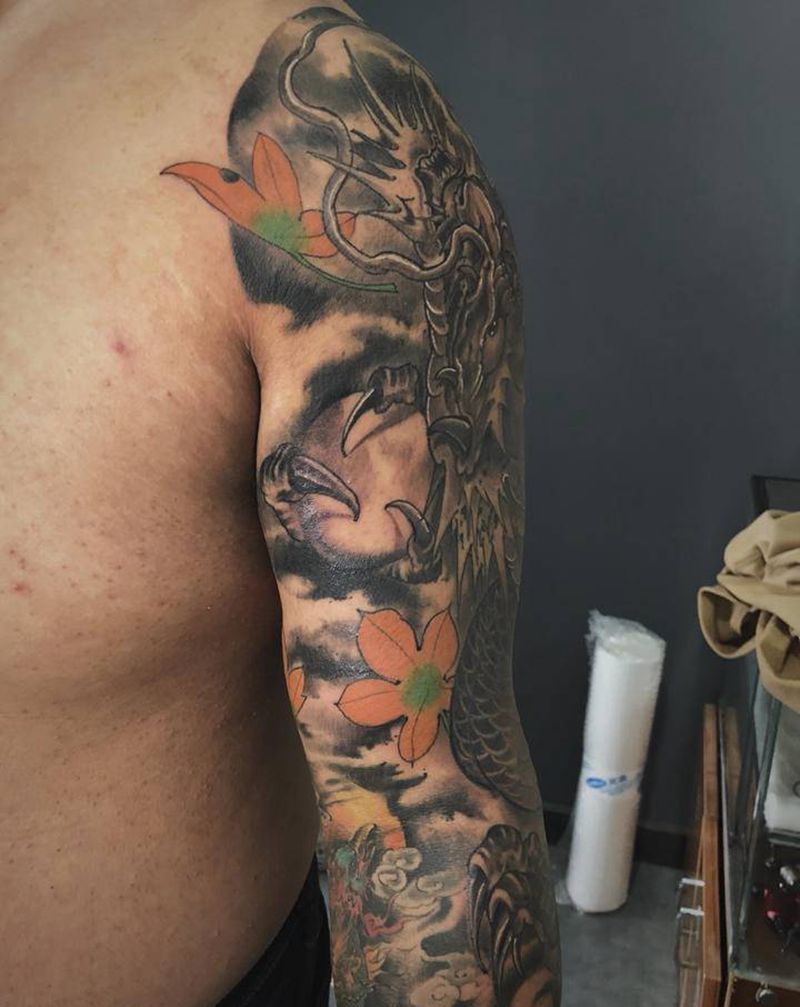 花臂龙纹身图片_手臂新传统纹身图案