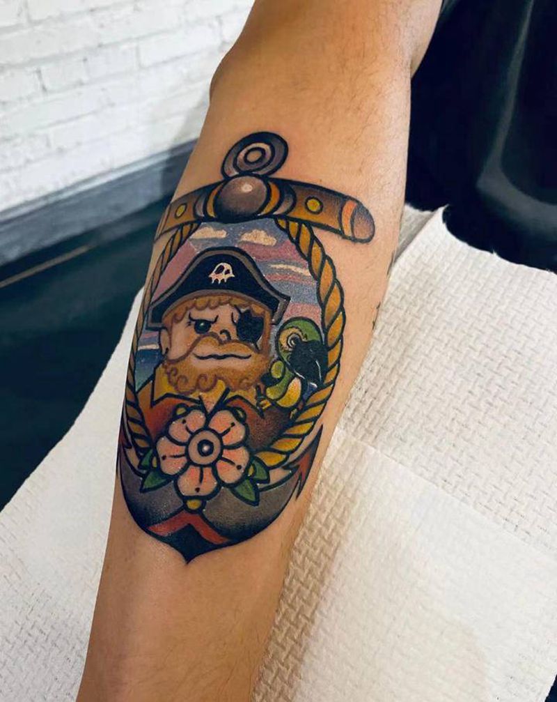 海盗船长纹身图片_手臂Old SchoolNew School鹦鹉船长大海纹身图案