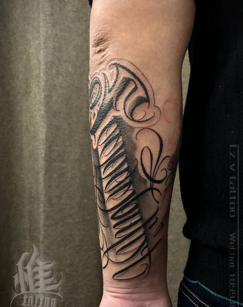 花体字纹身图片_手臂花体字纹身图案