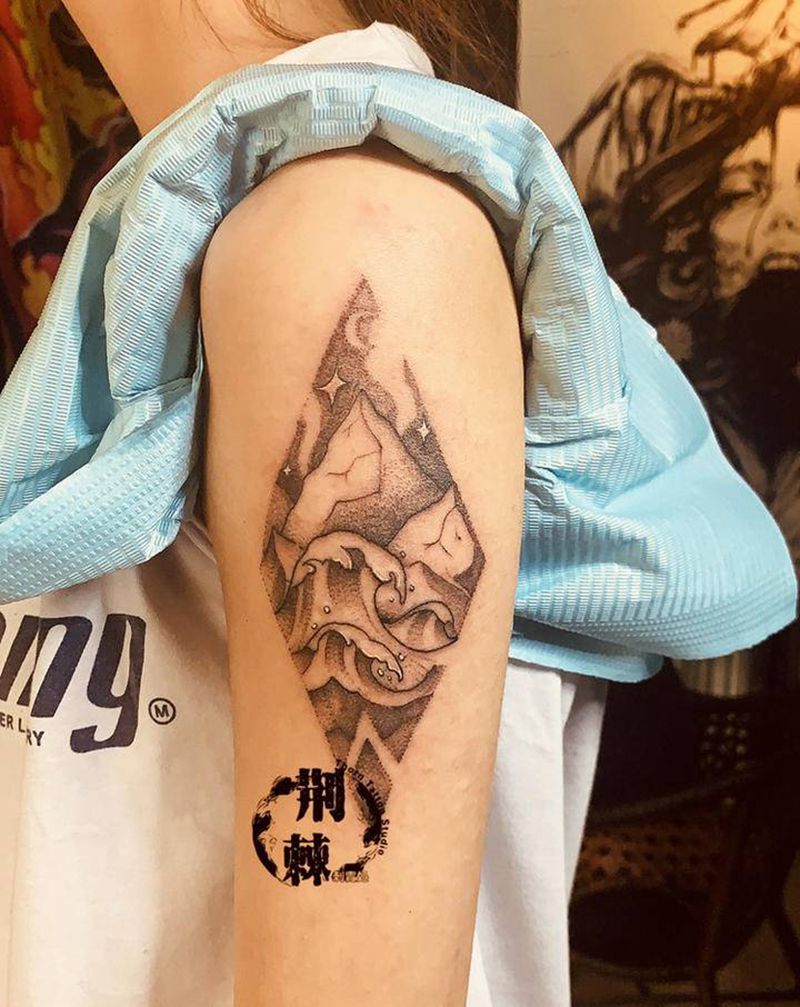 点刺 山与海纹身图片_手臂纹身图案