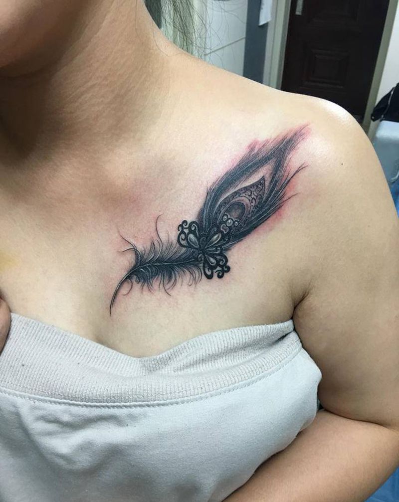 羽毛 遮盖纹身图片_胸部纹身图案