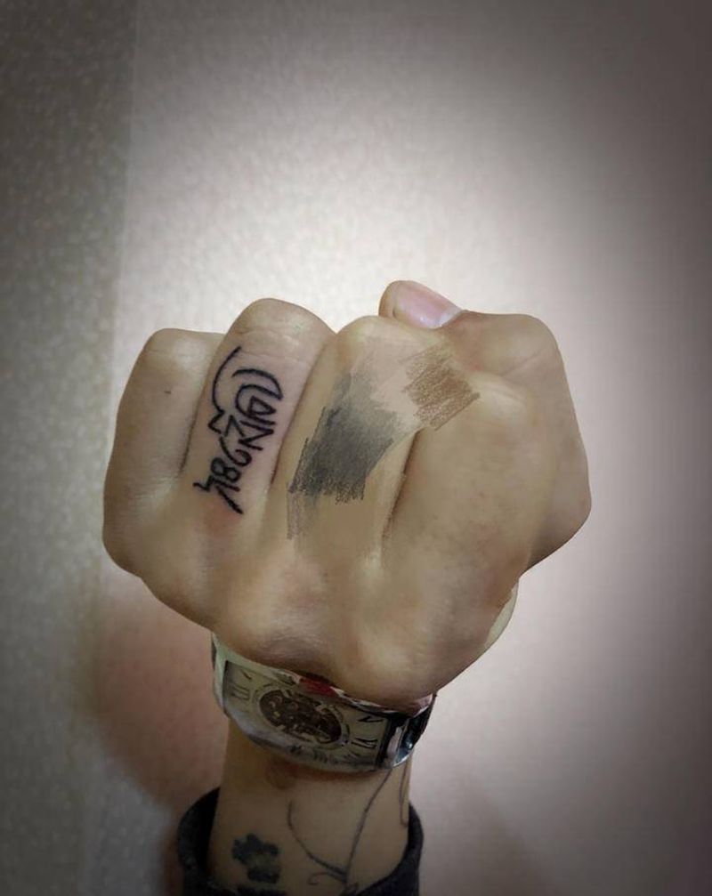 藏文纹身图片_手部花体字纹身图案