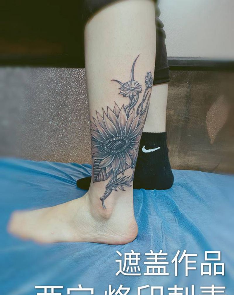 花纹身图片_腿部纹身图案