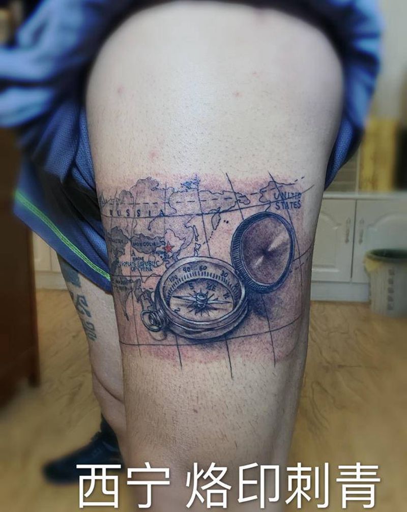 指南针纹身图片_腿部纹身图案