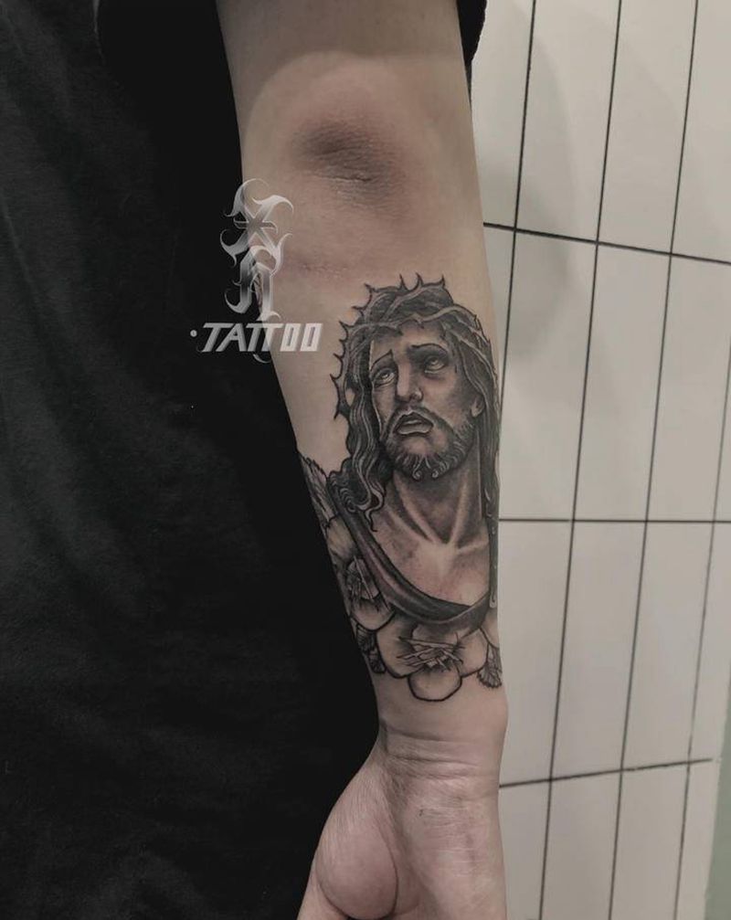 受难耶稣纹身图片_手臂black纹身图案