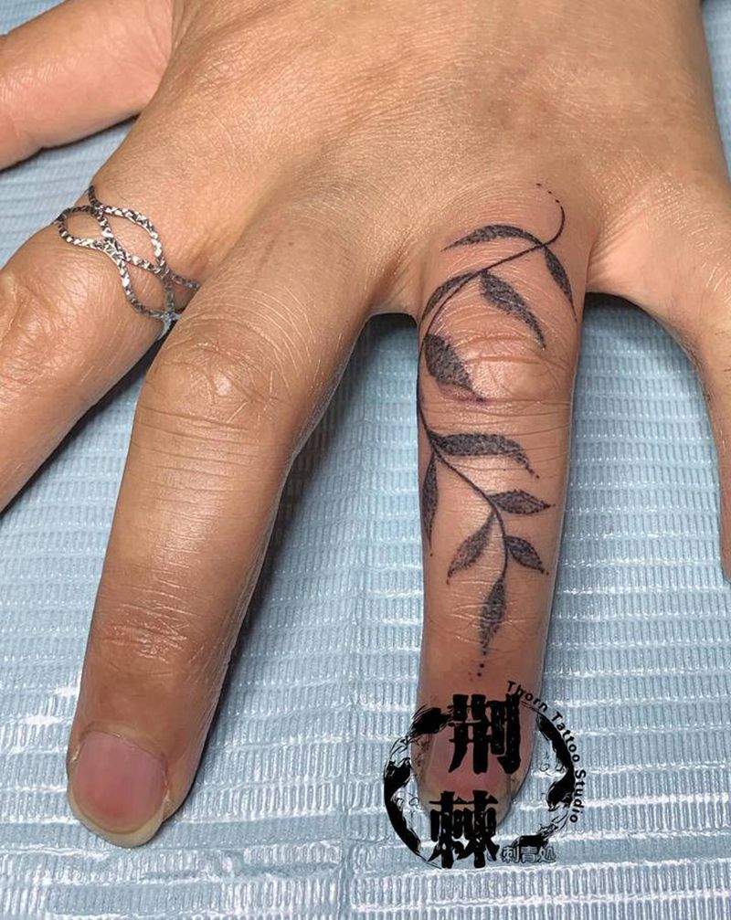 手指纹身图片_手部点刺纹身图案