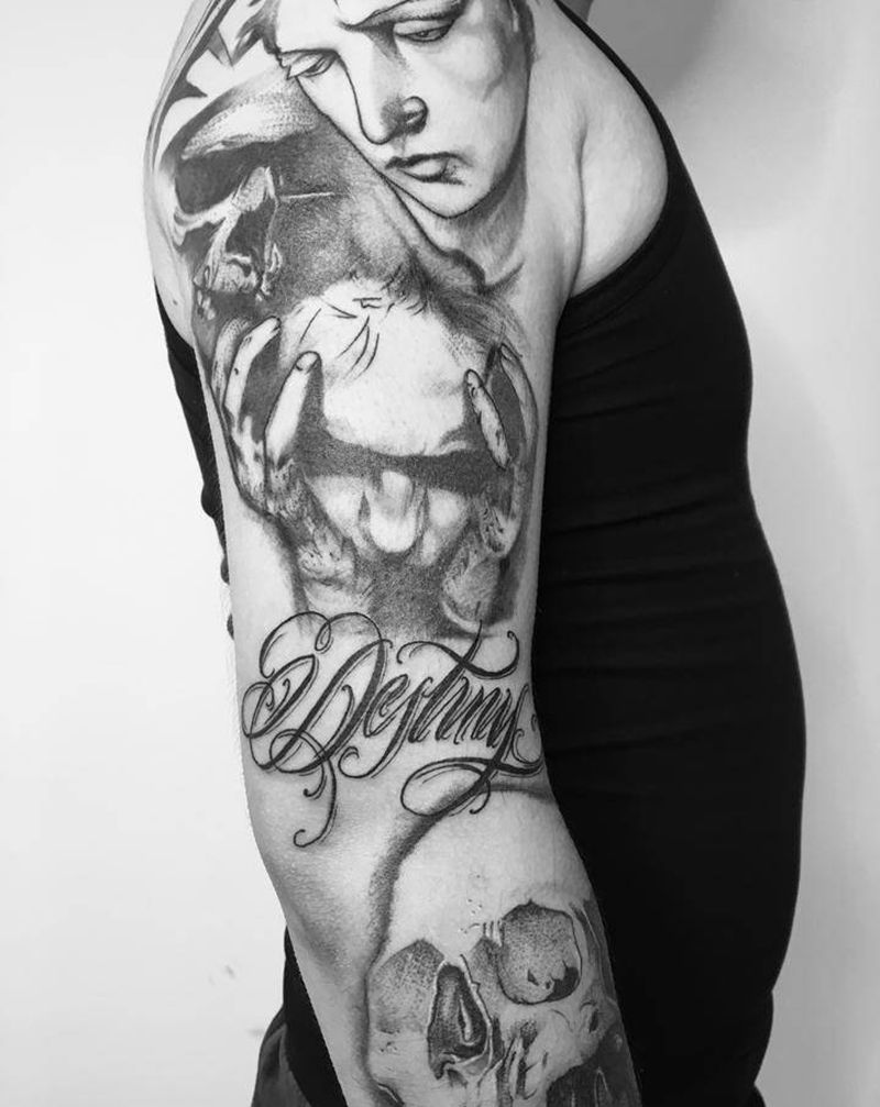 近日纹身图片_背部手臂纹身图案