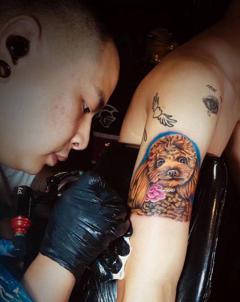 失去的伙伴纹身图片_手臂欧美写实Old School纹身图案